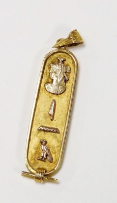 An Egyptian hieroglyphs pendant, of oval form, yellow metal, 5.3g. - 2