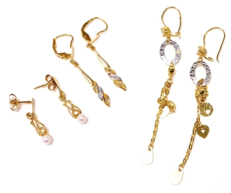 Three pairs of gold drop earrings, two set with cultured pearls, 7.8g.