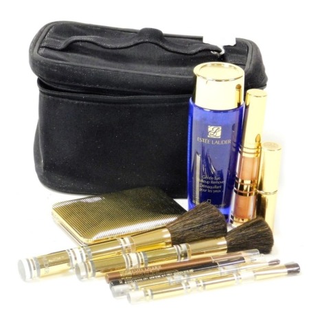 A selection of Estee Lauder make up, and applicator brushes, in a Lancome bag.