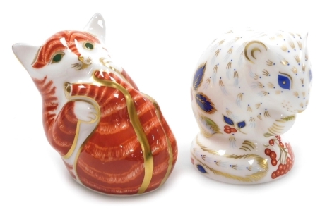 Two Royal Crown Derby porcelain paperweights, Derby Door Mouse, Royal Crown Derby Collector's Guild exclusive, gold stopper and red printed marks, 7cm high, and Kitten, gold stopper and red printed marks, 7cm high.