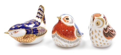 Three Royal Crown Derby porcelain bird paperweights, Owlet, Royal Crown Derby Collector's Guild exclusive, gold stopper and red printed marks, 6cm high, Anniversary Robin, Collector's Guild Exclusive, gold stopper and red printed marks, 6cm high, and Wren