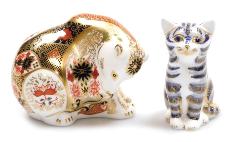 Two Royal Crown Derby porcelain paperweights, comprising Imari Polar Bear, silver stopper and red printed marks, 9cm high, and Kitten, silver stopper and red printed marks, 8cm high.