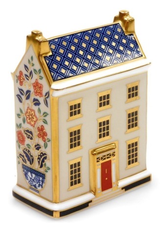 A Royal Crown Derby porcelain Georgian Townhouse paperweight, red printed marks, 10cm high, boxed.