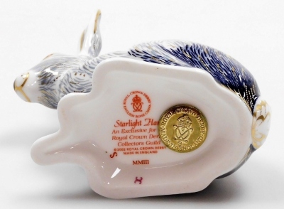 A Royal Crown Derby porcelain Starlight Hare paperweight, an exclusive for the Royal Crown Derby Collector's Guild, gold stopper and red printed marks, 12cm high, boxed. - 3