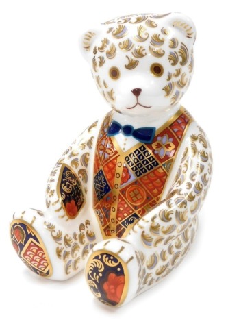 A Royal Crown Derby porcelain Teddy Bear paperweight, silver stopper and red printed marks, 11cm high, boxed.