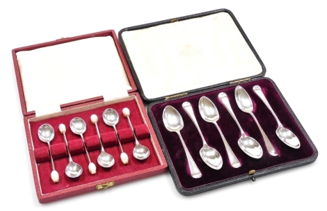 A set of six Edward VII silver Old English pattern teaspoons, decorated to the underside of each bowl with maritime motifs, Thomas Bradbury and Sons, Sheffield 1909, 2.88oz, cased, and a set of six Elizabeth II silver coffee spoons, of plain form with a s