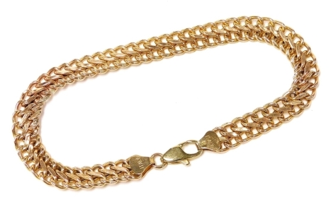 A 9ct gold two row curb link bracelet, on a lobster claw clasp, 5.0g.