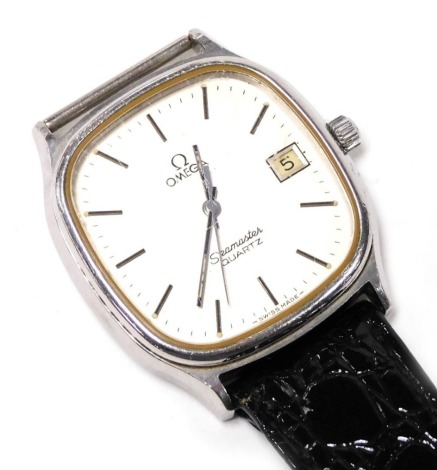 An Omega Seamaster gentleman's stainless steel cased wristwatch, square silvered dial bearing batons, centre seconds, date aperture, quartz movement, on a part leather strap.