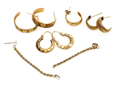 Assorted hoop and drop earrings, variously decorated, yellow metal.