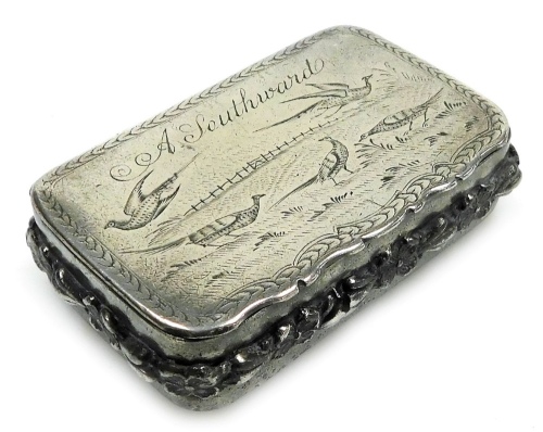 A 19thC pewter snuff box, of rectangular form, the top bright cut engraved with pheasants and titled A. Southward, the underside engraved with scrolls and the border with applied floral and leaf decoration, the hinged lid enclosing a vacant interior, 8cm