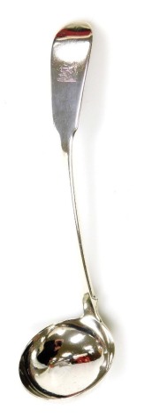 A William IV Scottish silver Fiddle pattern ladle, engraved crest, Edinburgh 1833, 1.01oz.