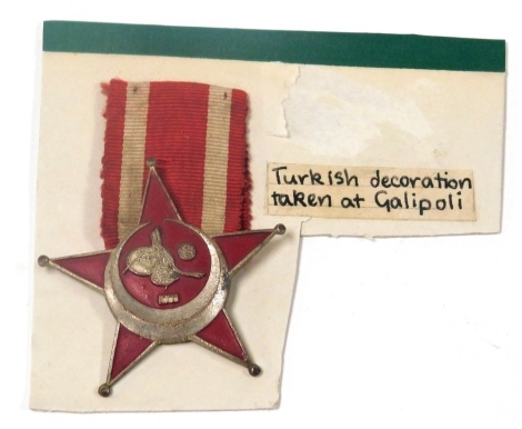 A World War I Ottoman Gallipoli Star, with ribbon.