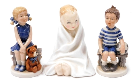 A Royal Doulton porcelain figure This Little Pig, HN2125, and two Royal Copenhagen Millennium Collection figures, Emma and Frederick, 10cm high. (3)