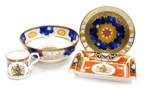 A group of Royal Worcester porcelain, comprising a millennium commemorative bowl, 23cm diameter, matching plate, Queen Elizabeth II Golden Jubilee tray, 22cm high, and matching beaker.