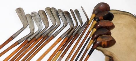 A collection of hickory shafted golf clubs, to include a James Lawson of Prestwick mashie niblick, McDowall mid iron, Forgan and other woods, etc. (some club heads and shafts AF)