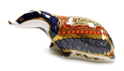 A Royal Crown Derby porcelain Moonlight Badger paperweight, an exclusive for the Royal Crown Derby Collector's Guild, gold stopper and red printed marks, 15cm wide, boxed.