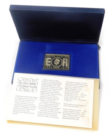 A Danbury Mint silver Post Office special commemorative stamp edition to commemorate the Silver Jubilee, with first day cover and certificates, boxed, 2.44oz.