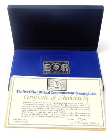 A Danbury Mint silver Post Office special commemorative stamp edition to commemorate the Silver Jubilee, with first day cover and certificates, boxed, 2.44oz.