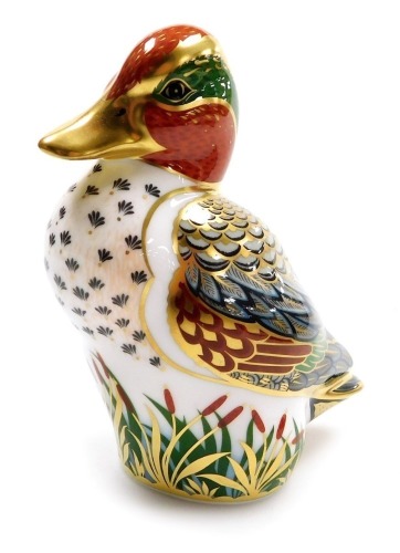 A Royal Crown Derby imari paperweight modelled as a green winged teal, boxed.