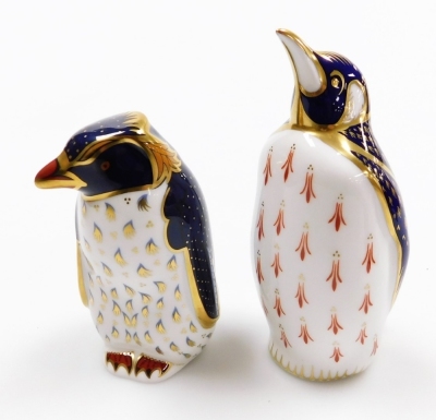 A Royal Crown Derby imari paperweight modelled as a rockhopper penguin, and another modelled as a penguin, second. (2)