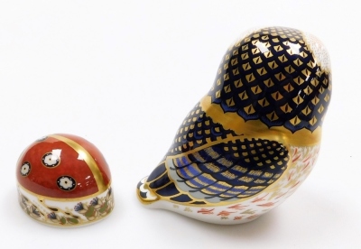 A Royal Crown Derby imari paperweight modelled as a tawny owl, together with another modelled as a ladybird, seconds. (2) - 2