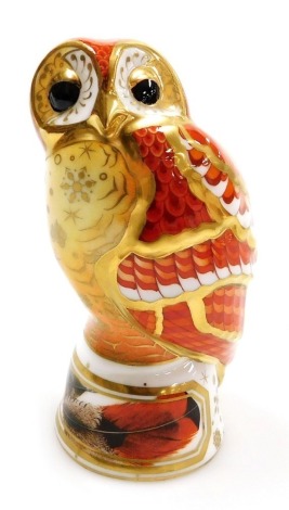 A Royal Worcester porcelain figure of a tawny owl, the Connoisseur Collection, 12cm high.