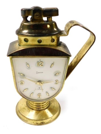 A mid 20thC Swiza brass cased novelty bedside clock, with integral cigarette lighter, shield shaped dial bearing Arabic numerals and quarters, jewelled clock work movement, 13cm high.