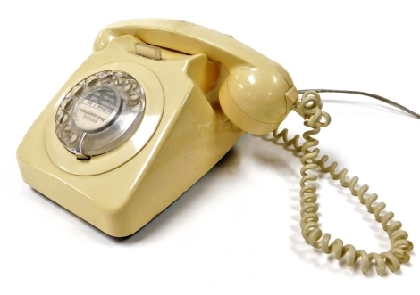 A GPO 746 telephone, in cream, bears number for Loughborough 842248.