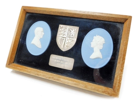 A Wedgwood Jasperware and silver framed plaque, to commemorate the Silver Jubilee of Her Majesty Queen Elizabeth II 1952-1977, showing bust profiles of the late Queen and His Royal Highness Prince Philip, Duke of Edinburgh, flanking a shield bearing the R