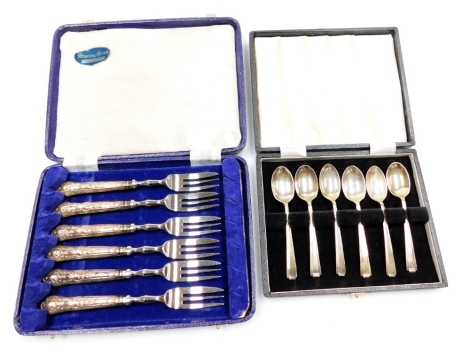 A set of six silver coffee spoons, Sheffield 1970, cased, 2.53oz, and six silver King's pattern handled fruit forks, cased, Sheffield 1979.