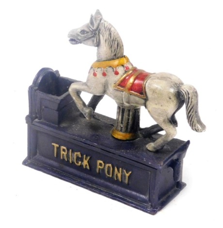 A replica cast iron trick pony money box, 18.5cm wide.