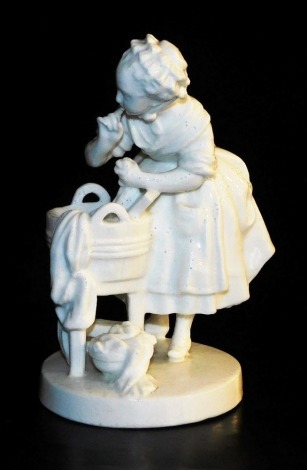 A 19thC Meissen white glaze porcelain figure of a washer woman, modelled standing over her wash tub, raised on a circular base, blue crossed swords mark, 14.5cm high.