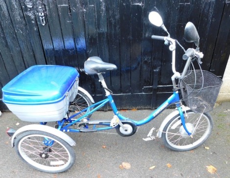 A Sunrunner lady's electric tricycle, blue framed with back pack.