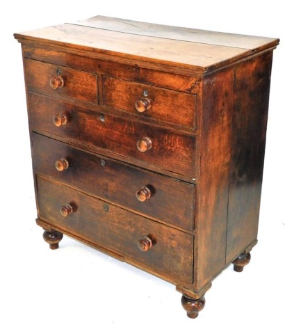 A Victorian oak chest of two short over three long graduated drawers, raised on bun feet, 106cm high, 96cm wide, 51cm deep.