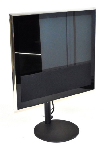 A Bang & Olufsen BeoVision 32" colour television, with stand.