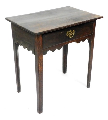 A George III oak side table, with a single frieze drawer, raised on square tapering legs, 73cm high, 70cm wide, 45.5cm deep.