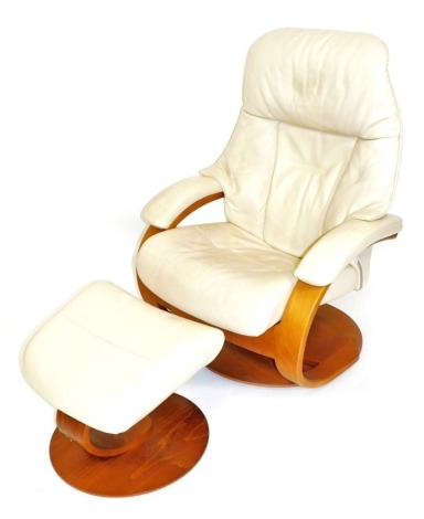 A Stressless cream leather armchair, with matching footstool.