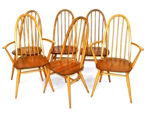 A set of six Ercol beech and elm Quaker back dining chairs, model 365, comprising a pair of carvers and four single chairs.