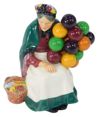 A Royal Doulton The Old Balloon Seller figure HN1315, 20cm high.