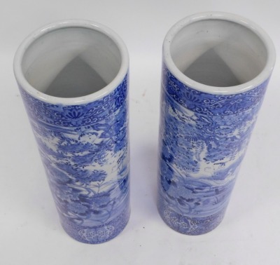 A pair of Japanese blue and white stick stands, each with a bird of prey and floral spray design, unmarked, each 77cm high, 26cm diameter. - 3