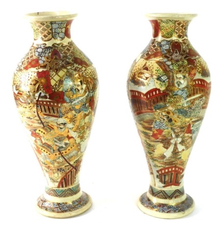 A pair of Japanese Eastern ware vases, each with a lobed top, on bulbous stem, two character stamps to underside, 28cm high.