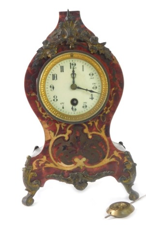 A 20thC Boulle mantel clock, with white ceramic numeric dial, 12cm high.