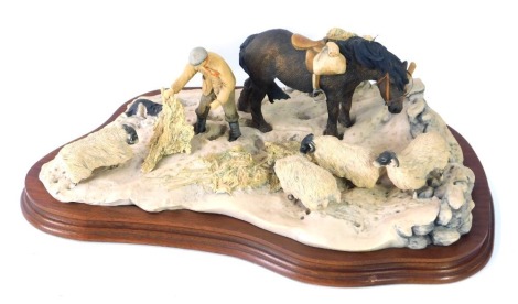 A Border Fine Arts figure group, of horse and sheep at feeding time, on wooden base, 35cm wide.