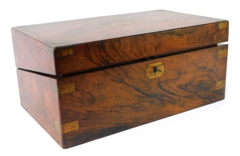 A Victorian walnut writing box, with brass bound corners and escutcheon, and a black faux leather lined interior, 19cm high, 40cm wide, 25cm deep.