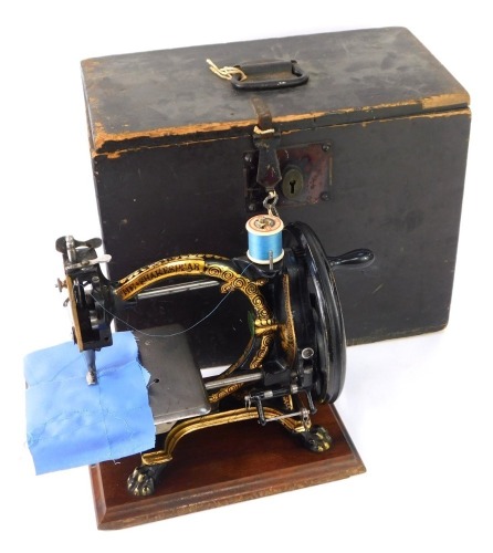 An antique 'Shakespeare' manual sewing machine, by The Royal Sewing Machine Co. Limited, partly stamped The Shakespeare and Illstones, on a mahogany base, makers plaque to front, in pine carry case, 28cm high. (AF)