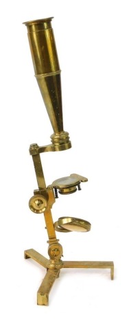 A 19thC brass microscope, stamped to base Troughton & Simms of London, 30cm high.