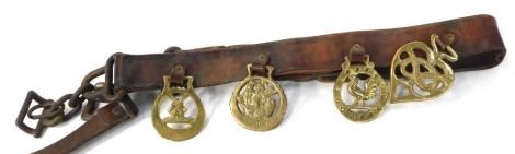 A military leather bridle, with arrow marked R and Mason, Walsall 1946 and four associated brasses comprising Mayflower, windmill, cockerel and knot.