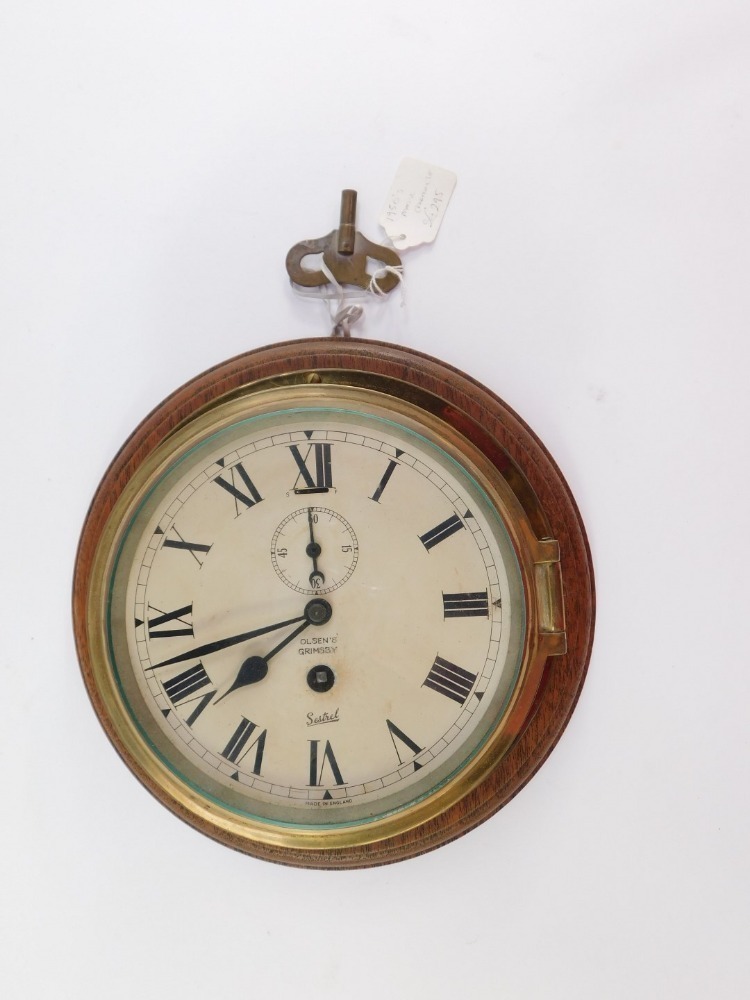 Sestrel Clock A Sestrel early 20thC brass cased ships bulkhead clock, for Olsen's of ...