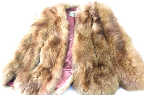 A Bacon Limited Fashion House of Liverpool mink cape, in light brown, with a pink lined interior, bearing label.