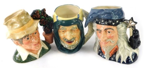 Three large character jugs, comprising Royal Doulton The Gardener D6867, Royal Doulton The Wizard D6862, and a Staffordshire Sheikh. (3)